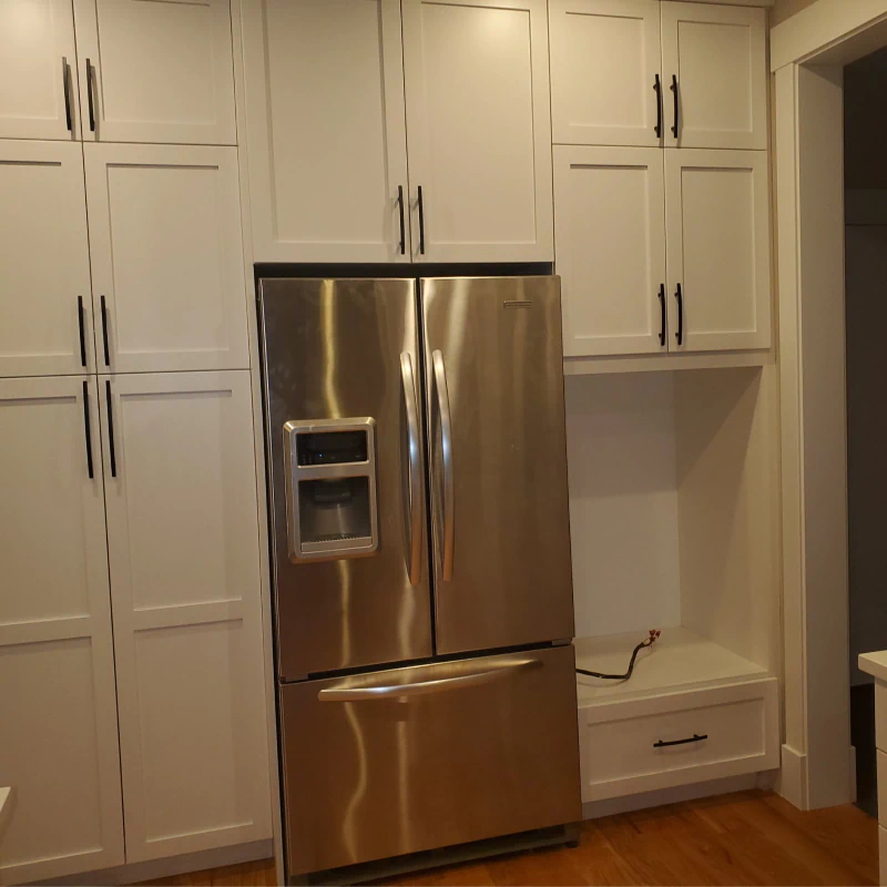 a newly remodeled kitchen showcasing the modern refrigerator